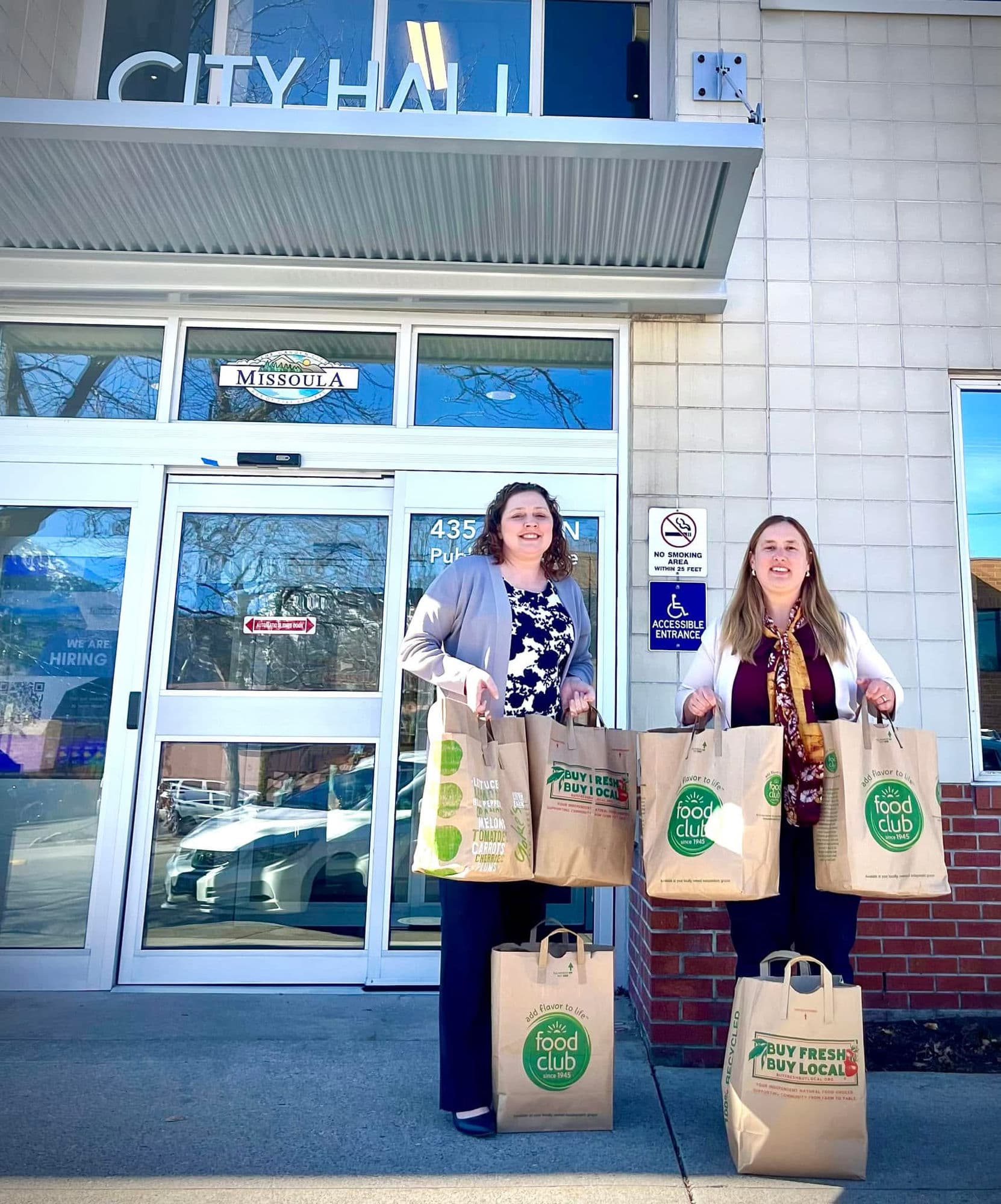 A&M Law team members supporting a local food drive at Missoula City Hall